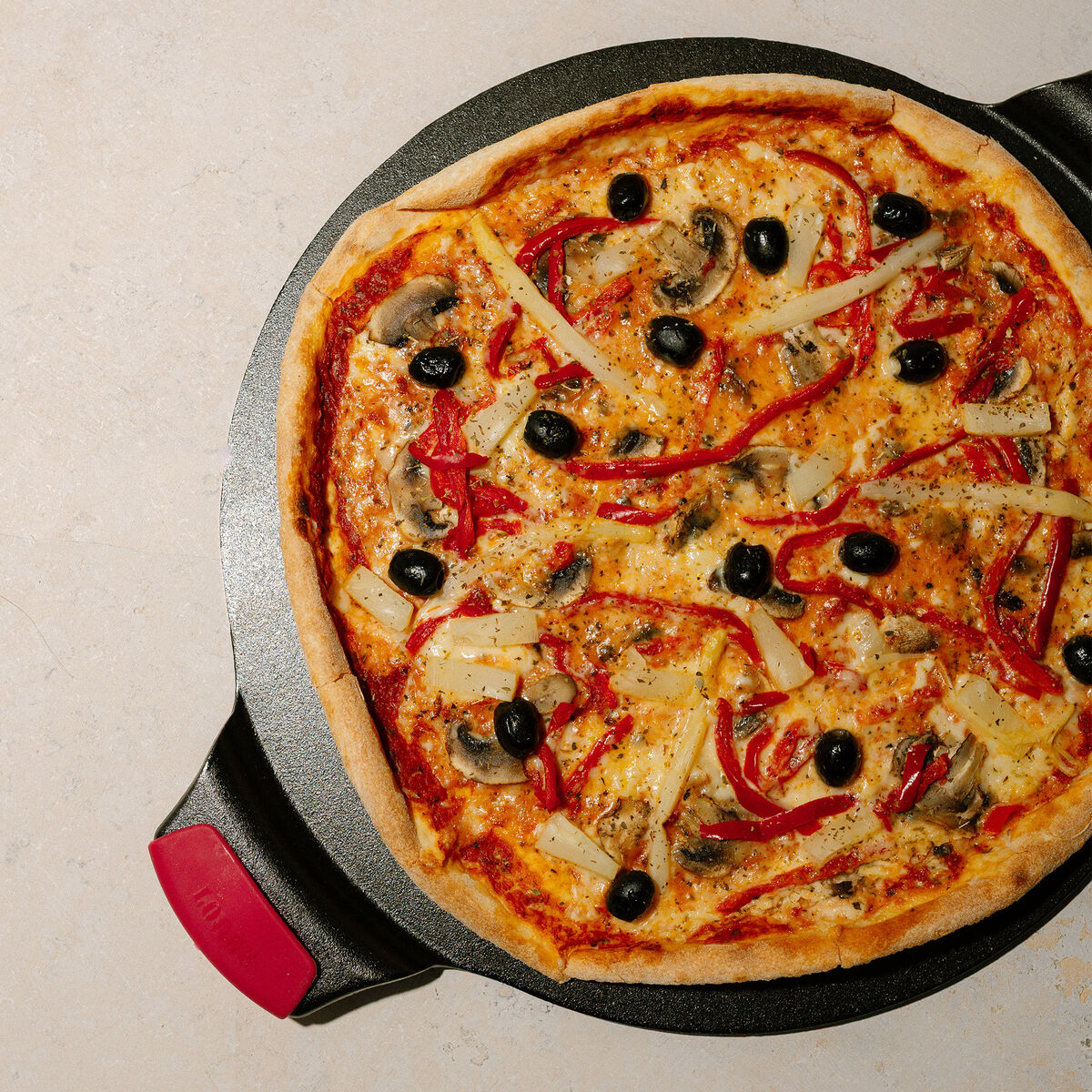 Lodge Pizzasten med håndtag, støbejern
