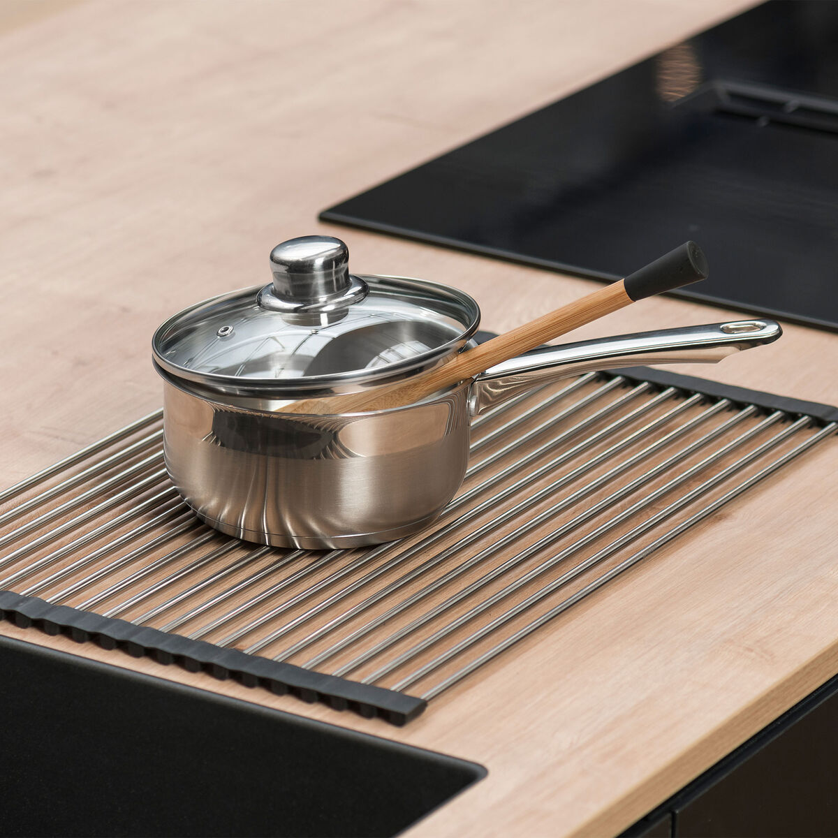 Ihoprullbar diskmatta 48 × 33 cm, rostfritt stål/silikon