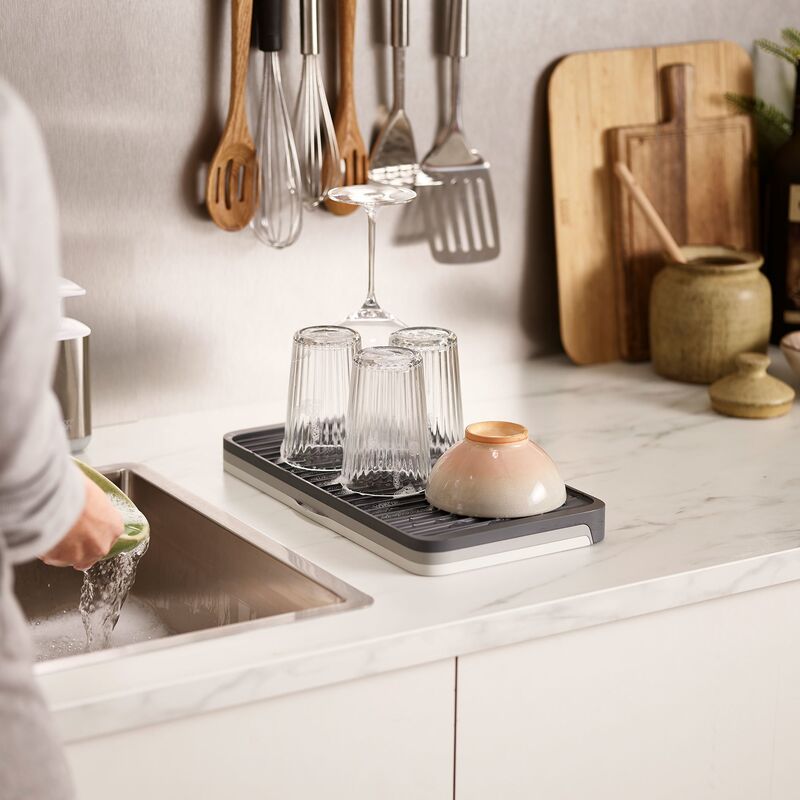 Utdragbart diskunderlägg, grå