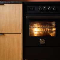 PRO105I2ECAT Professional induktionsspis med dubbelugn, 100 cm, svart 