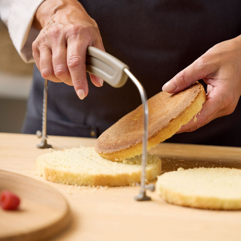 Justerbar tårtbottenskärare