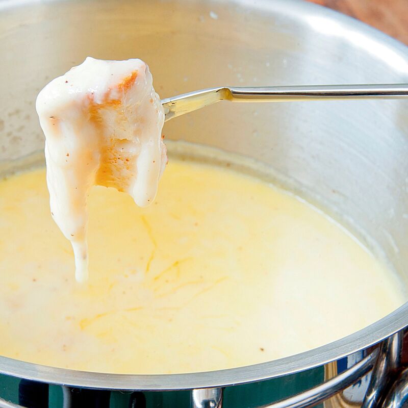 Fonduesetti, jossa 8 haarukkaa, musta