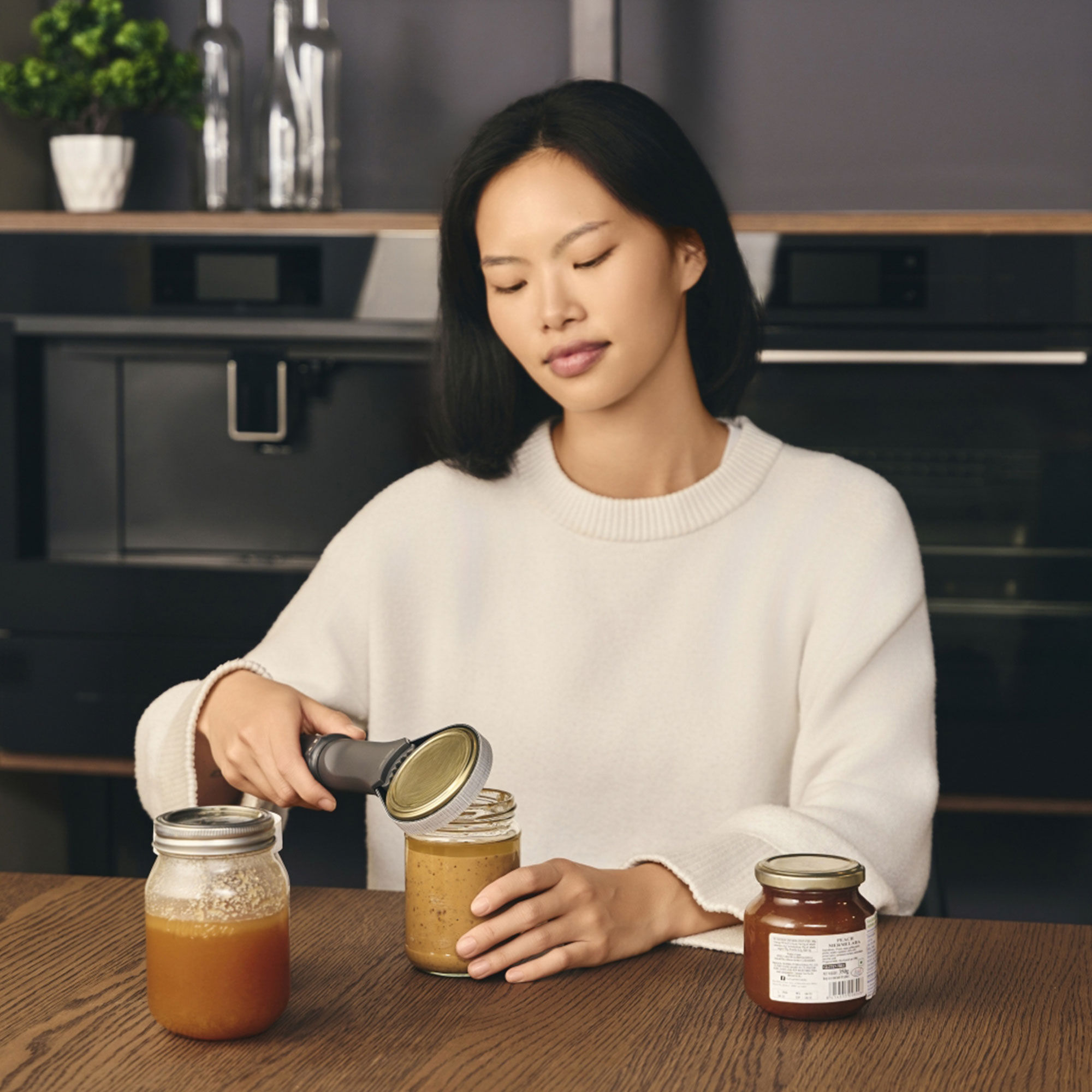 Kannen- ja purkinavaaja 23,2 cm