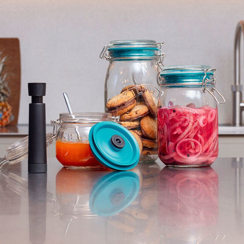 Vakuumset med pump, lock och vakuumstoppers