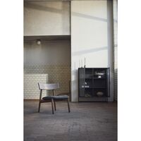 Tetra fauteuil donker geolied