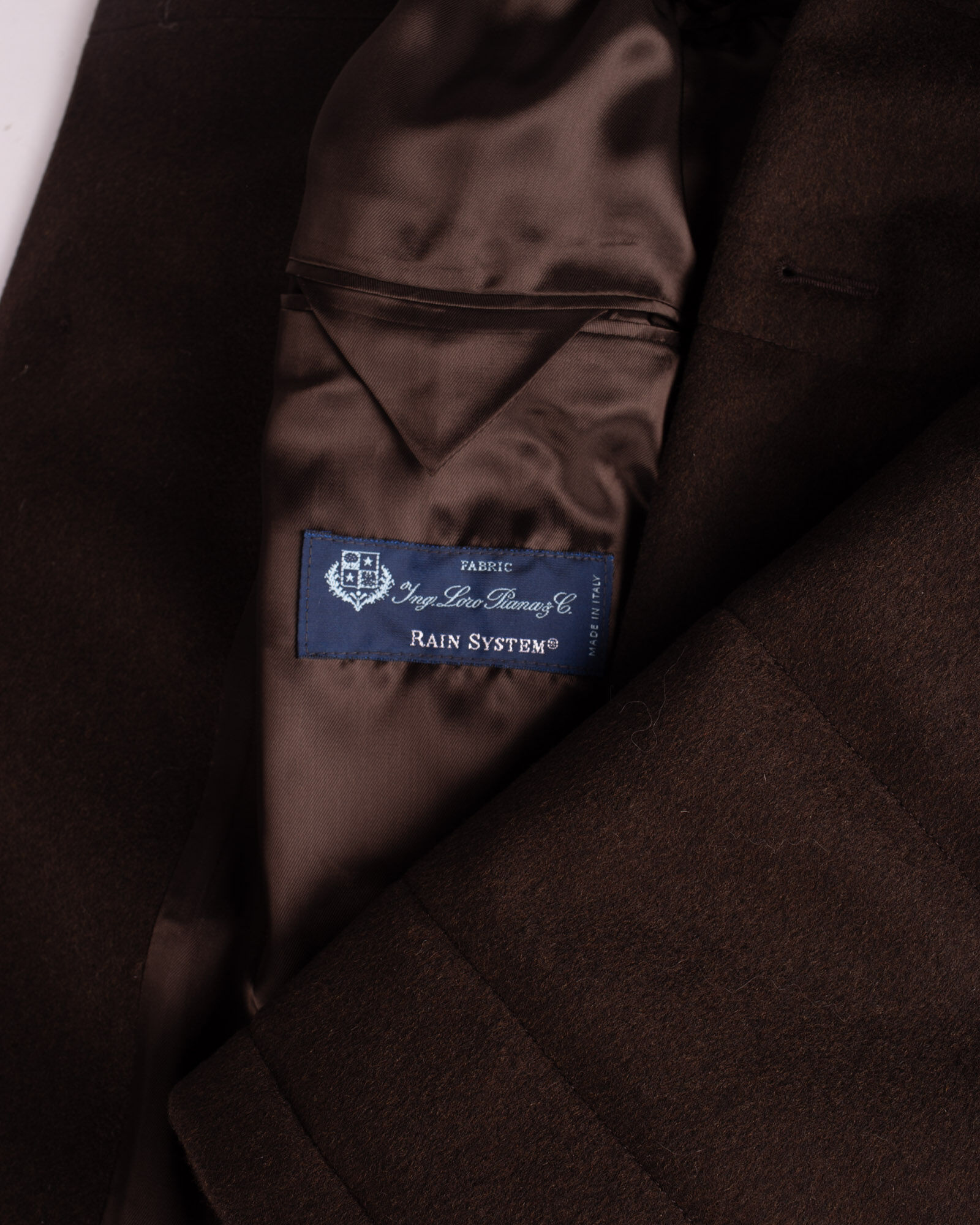 Closeup of label of Brown padded coat