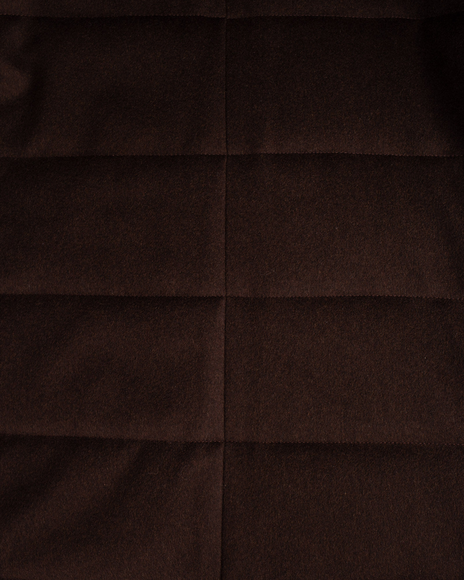 Closeup of back of Brown padded coat