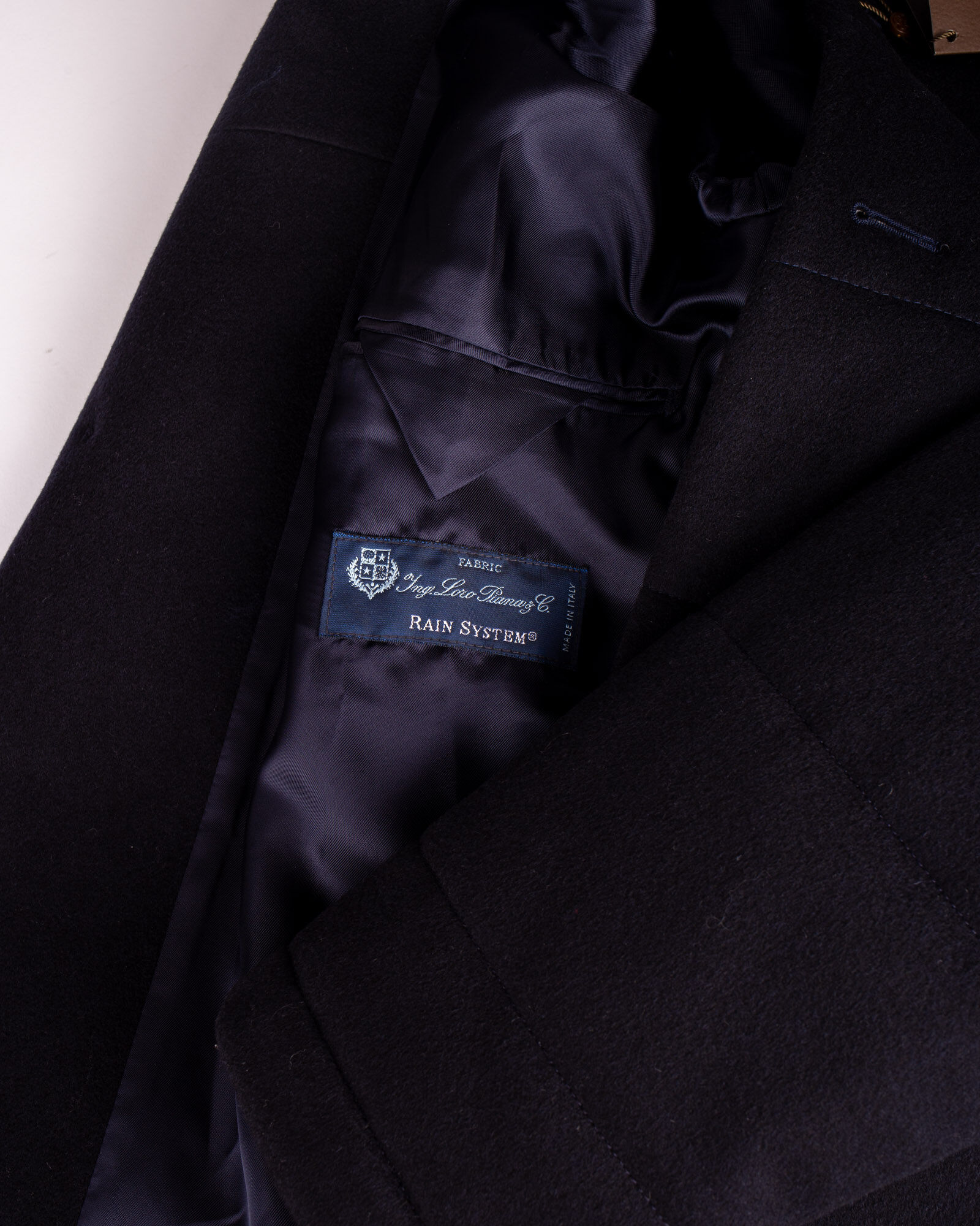 Closeup of label of Navy padded coat