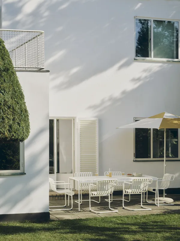 Palissade Cantilever Dining Armchair Cream white powder coated steel