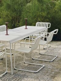 Palissade Cantilever Armchair Cream white powder coated steel