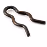 Retaining fjær