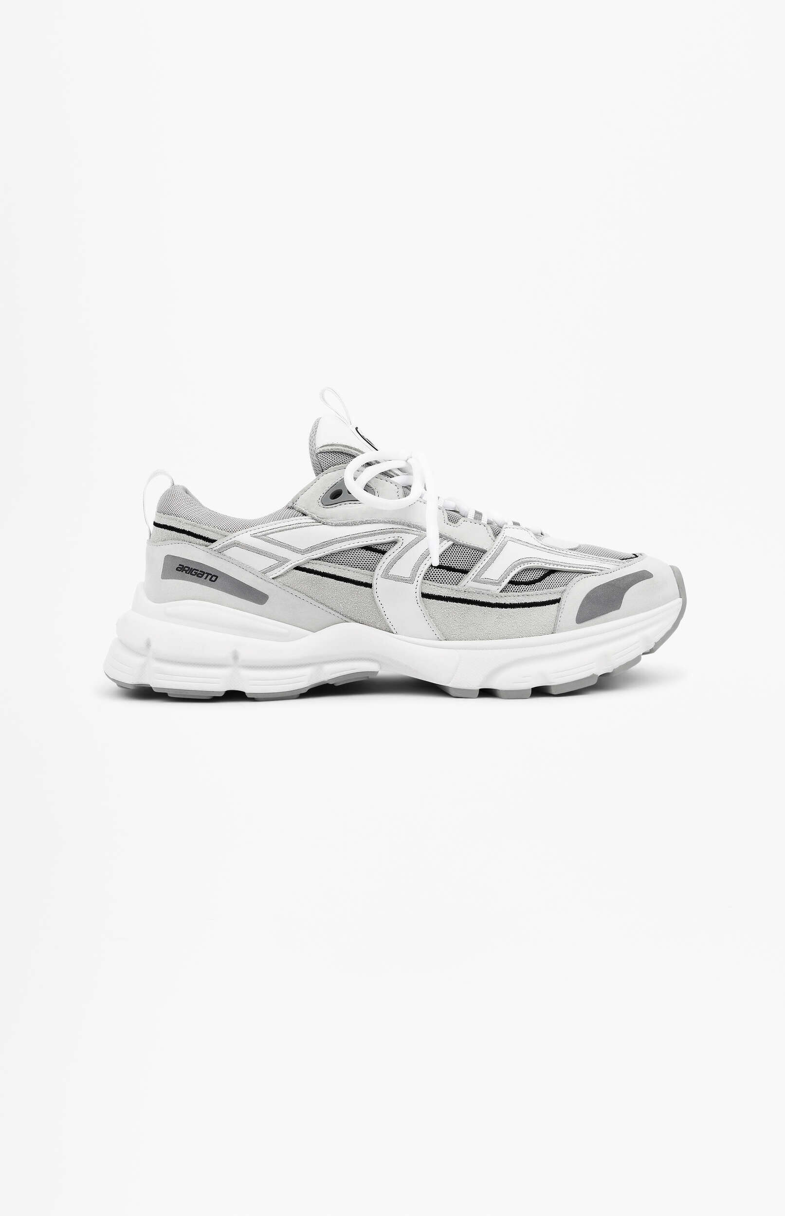 A white and grey chunky sneaker with a thick white sole, mesh details, and white laces, featuring 'ARIGATO' branding on the side, displayed on a plain white background.