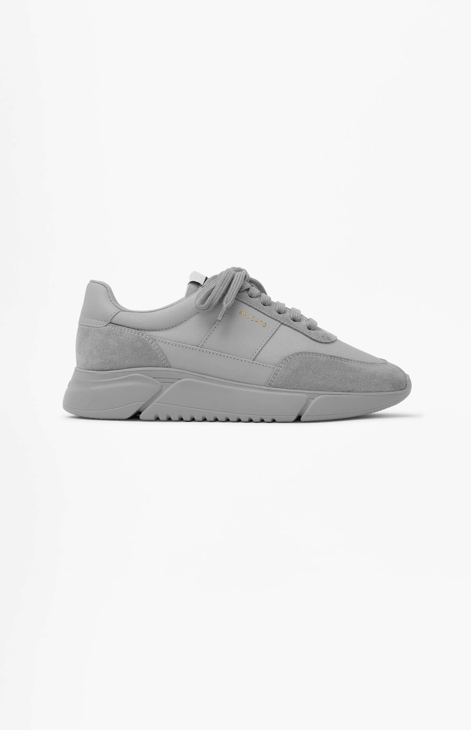 A single light gray ARIGATO sneaker with a chunky sole and suede accents, displayed on a clean white background.