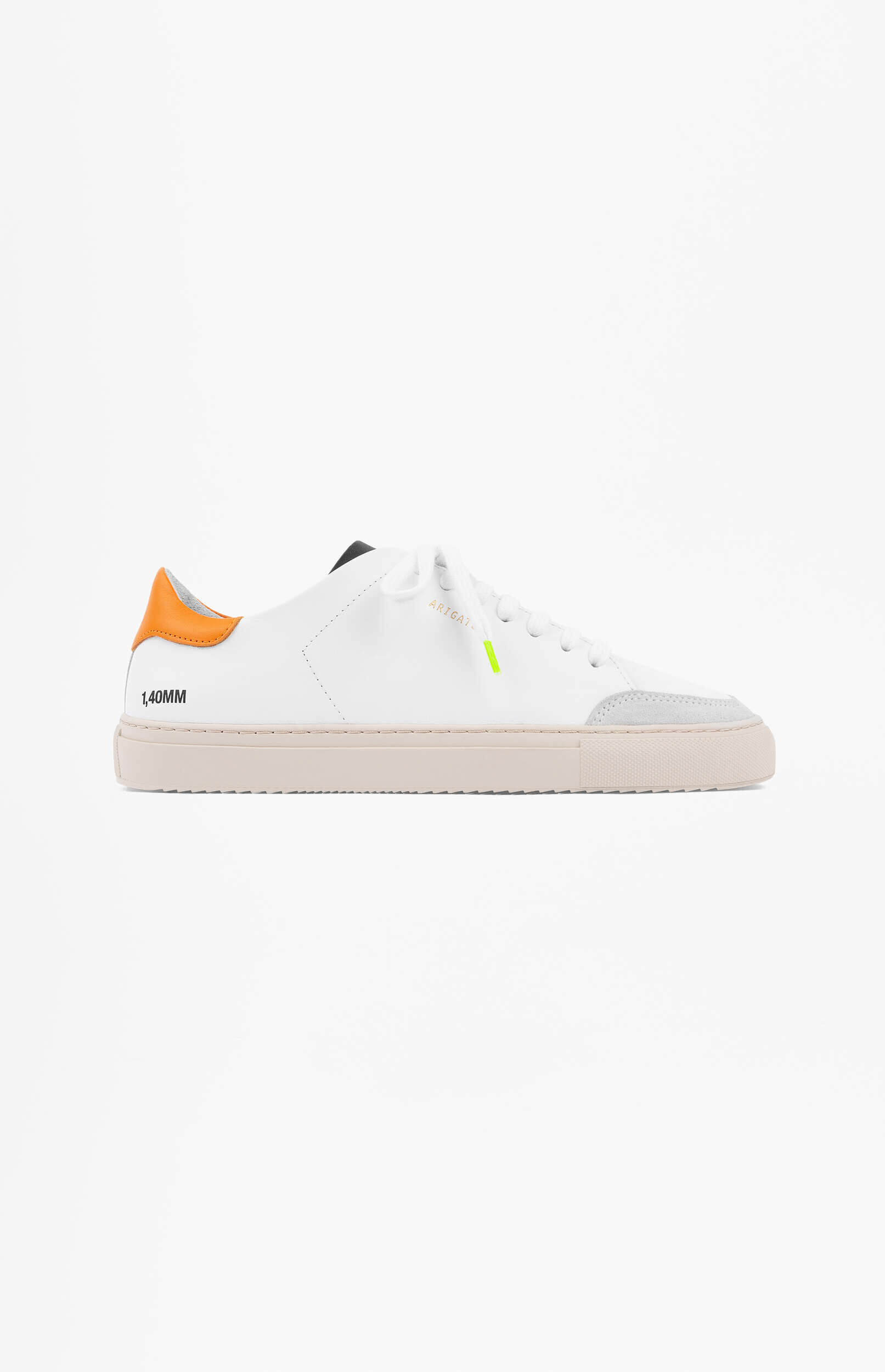 A white leather low-top sneaker with an orange heel tab, light beige sole, and grey suede toe detail, featuring 'ARIGATO' branding on the side and a neon yellow aglet on the laces. The text '1,40MM' is printed on the side near the heel.
