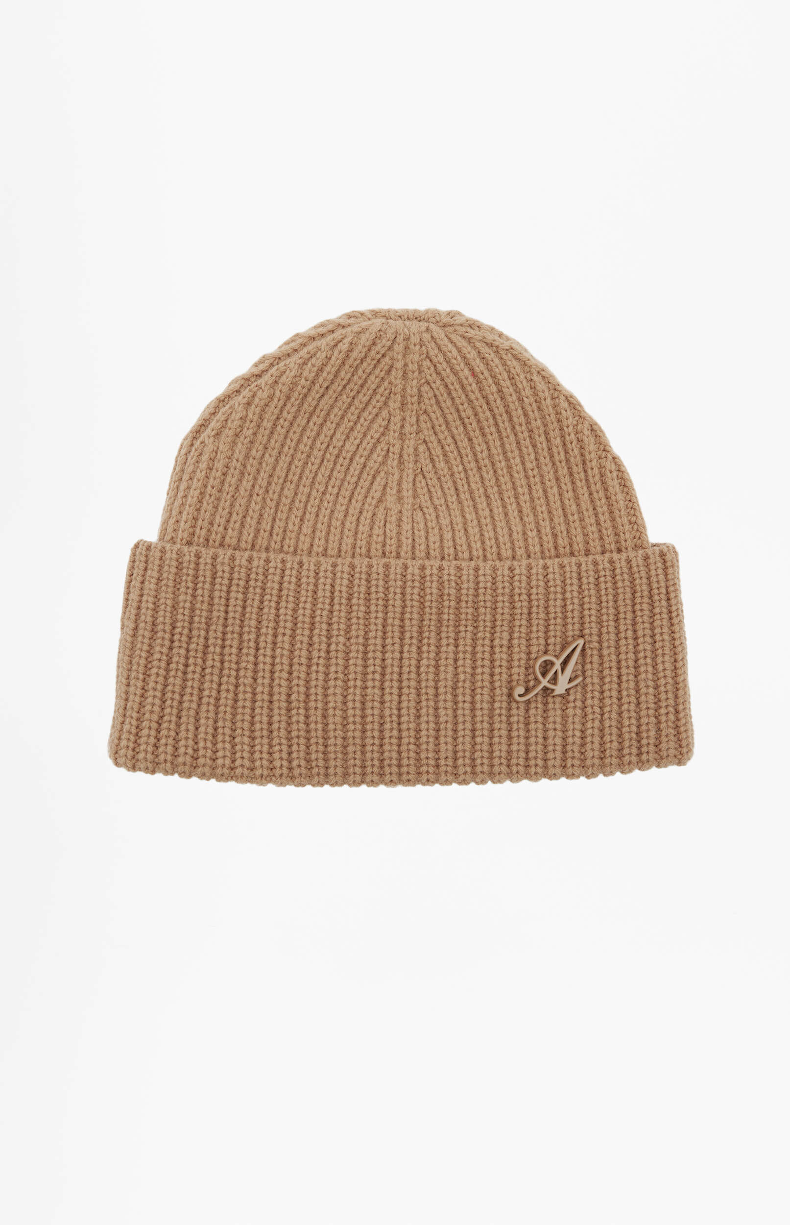 A light brown (camel-colored) ribbed knit beanie, styled with a folded brim and featuring a small, subtle metallic cursive 'A' logo on the front. The beanie is presented against a clean white background.