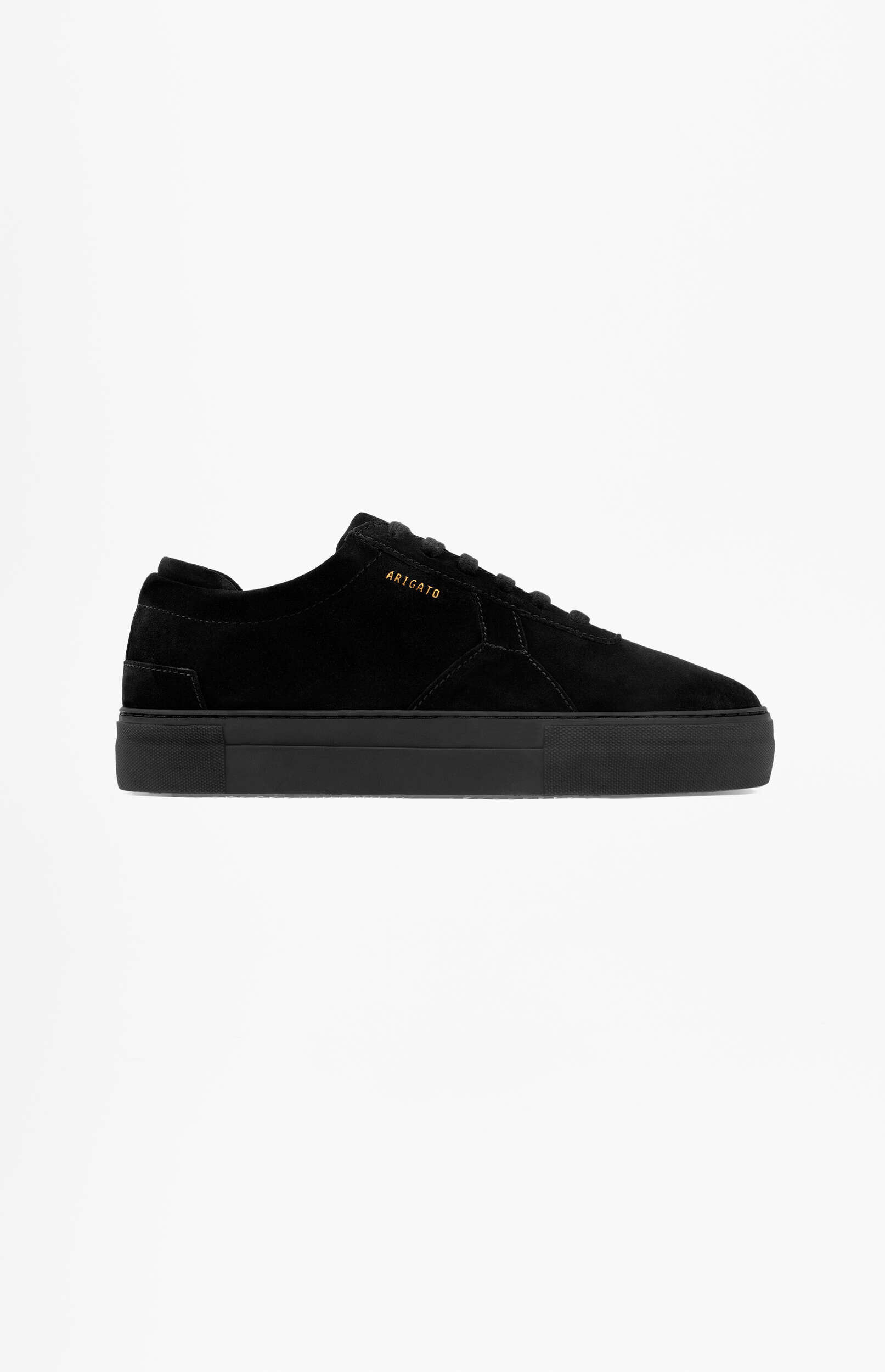 A black suede low-top sneaker with a black sole and gold 'ARIGATO' branding on the side, viewed from the side on a white background.