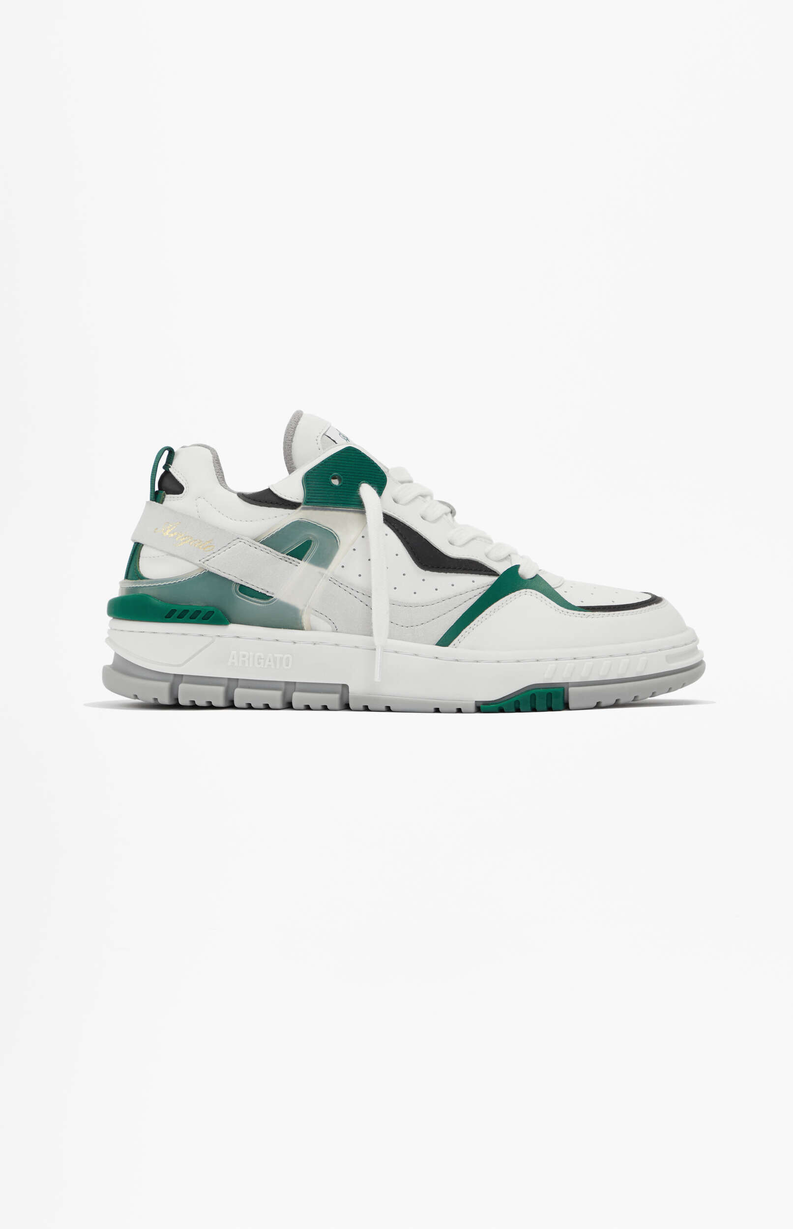 A white sneaker with dark green, black, and light grey accents, featuring a multi-layered upper design and a chunky grey sole with visible brand name 'ARIGATO'. The shoe is presented from a side view on a clean white background.