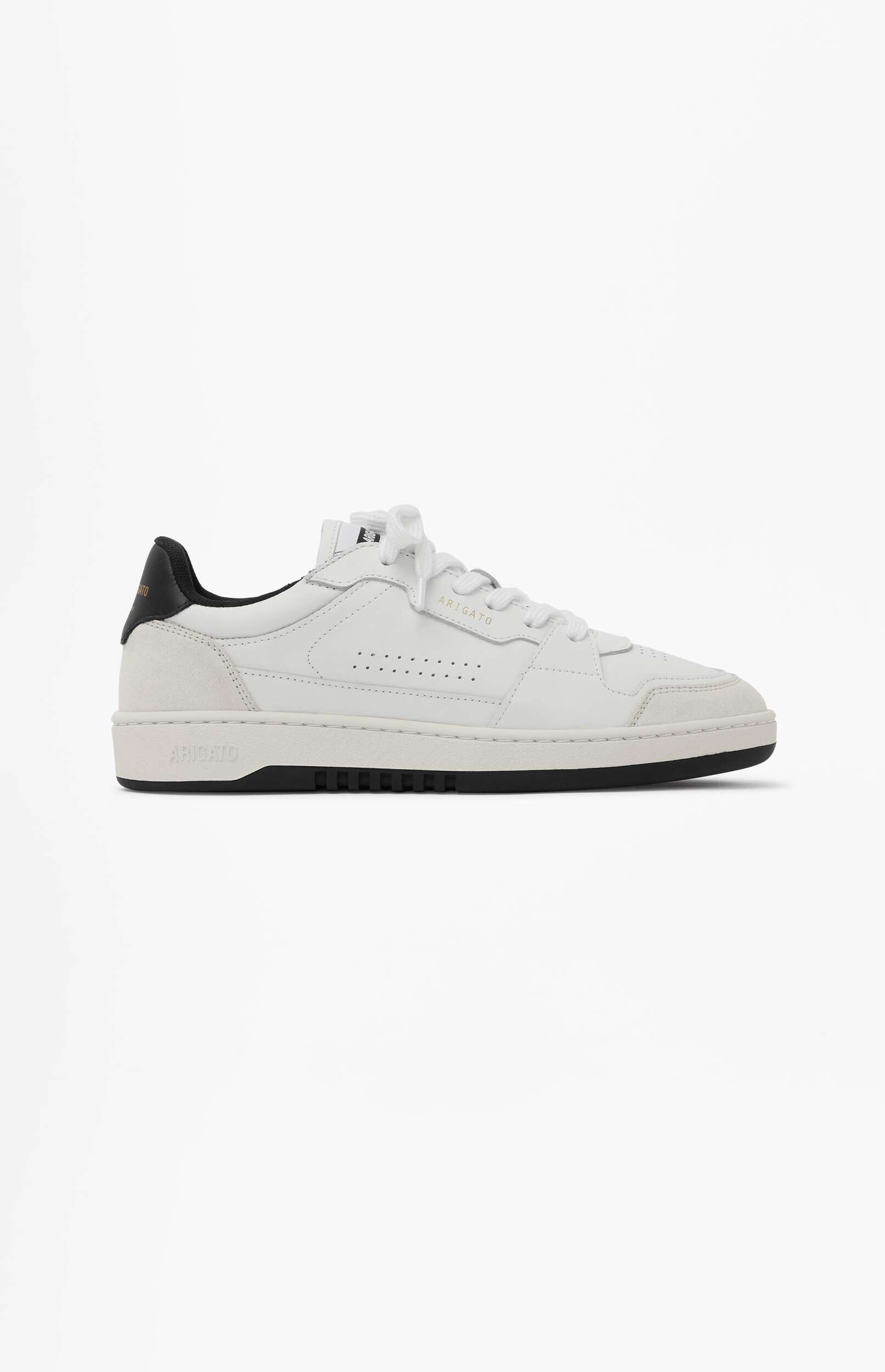 A white low-top sneaker from Axel Arigato with a black heel tab and black outsole, displayed in a side profile on a plain white background.