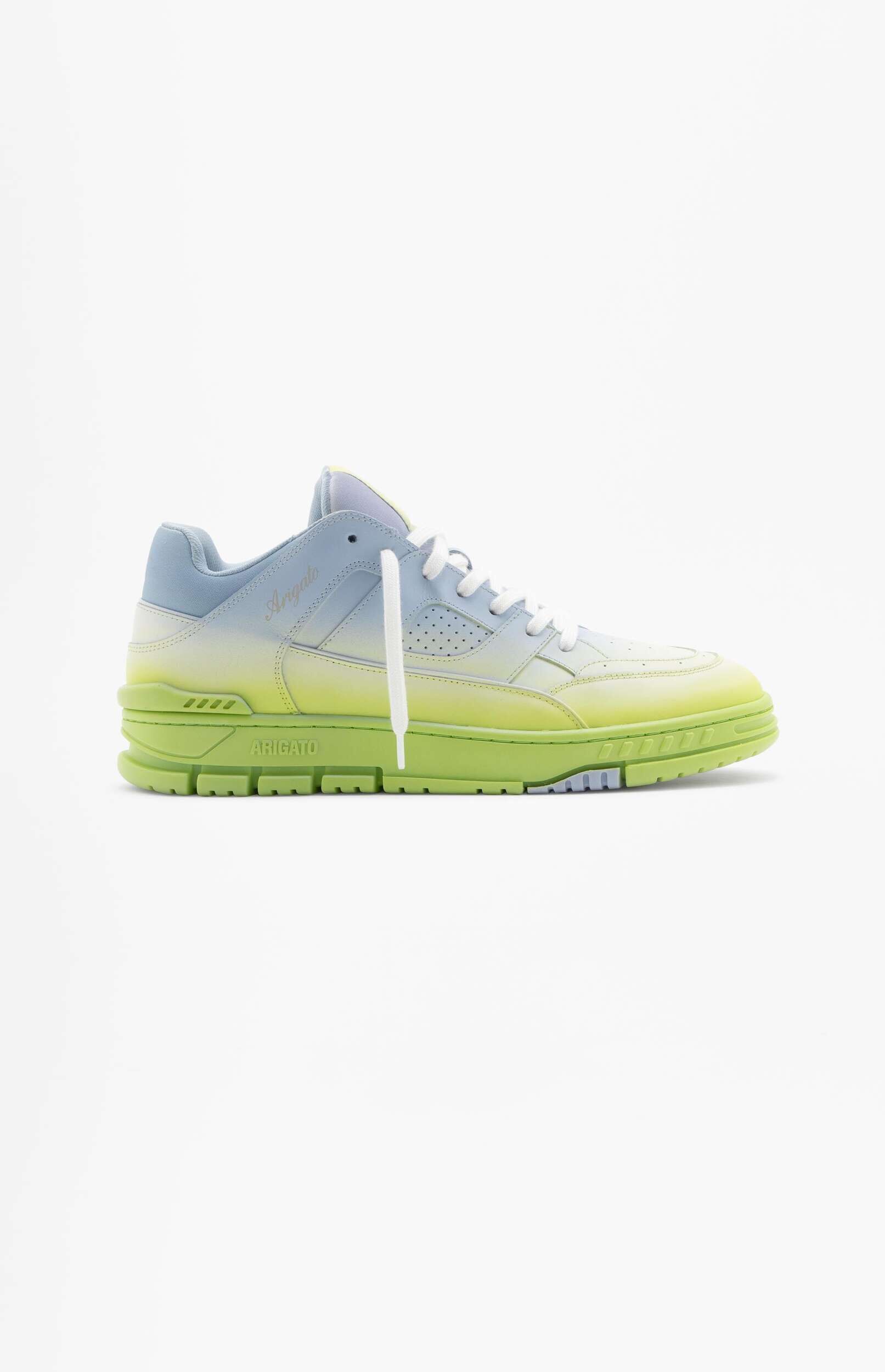 A single Axel Arigato sneaker with a gradient color transition from light blue at the top to vibrant lime green on the sole and lower upper, featuring white laces and a chunky sole, displayed on a plain white background.