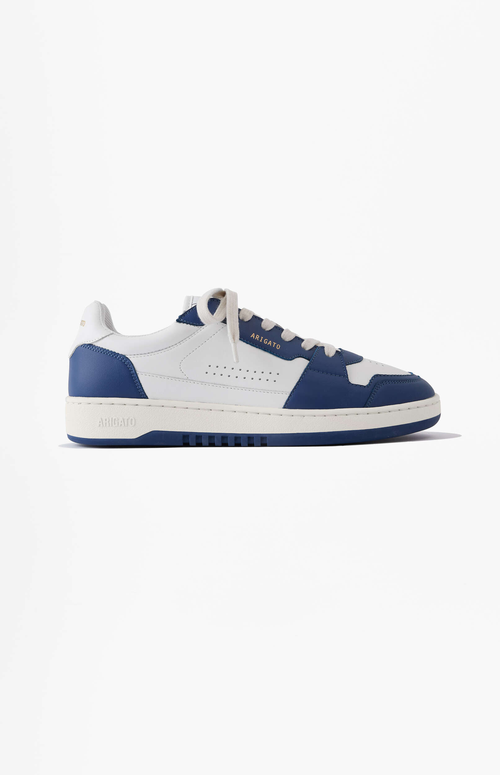 A stylish white and deep blue low-top sneaker from the brand Arigato, featuring cream laces and a visible Arigato logo on the side, presented on a clean white background.