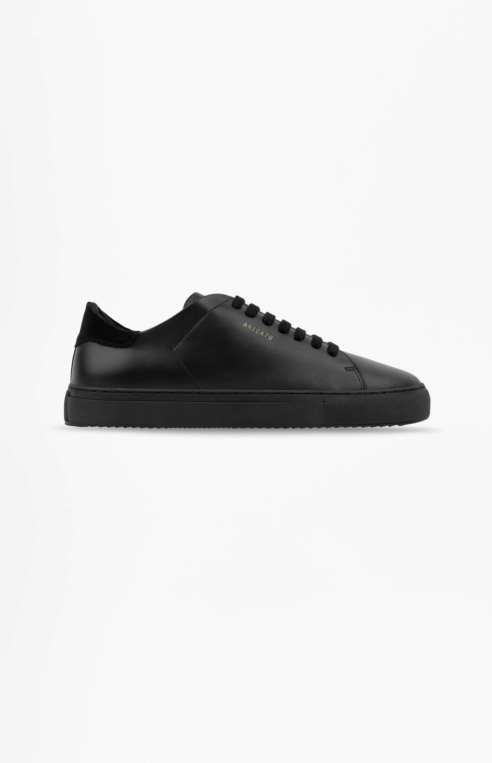 A single black leather low-top sneaker with black laces and a black sole, featuring 'ARIGATO' in gold lettering on the side, presented against a clean white background.