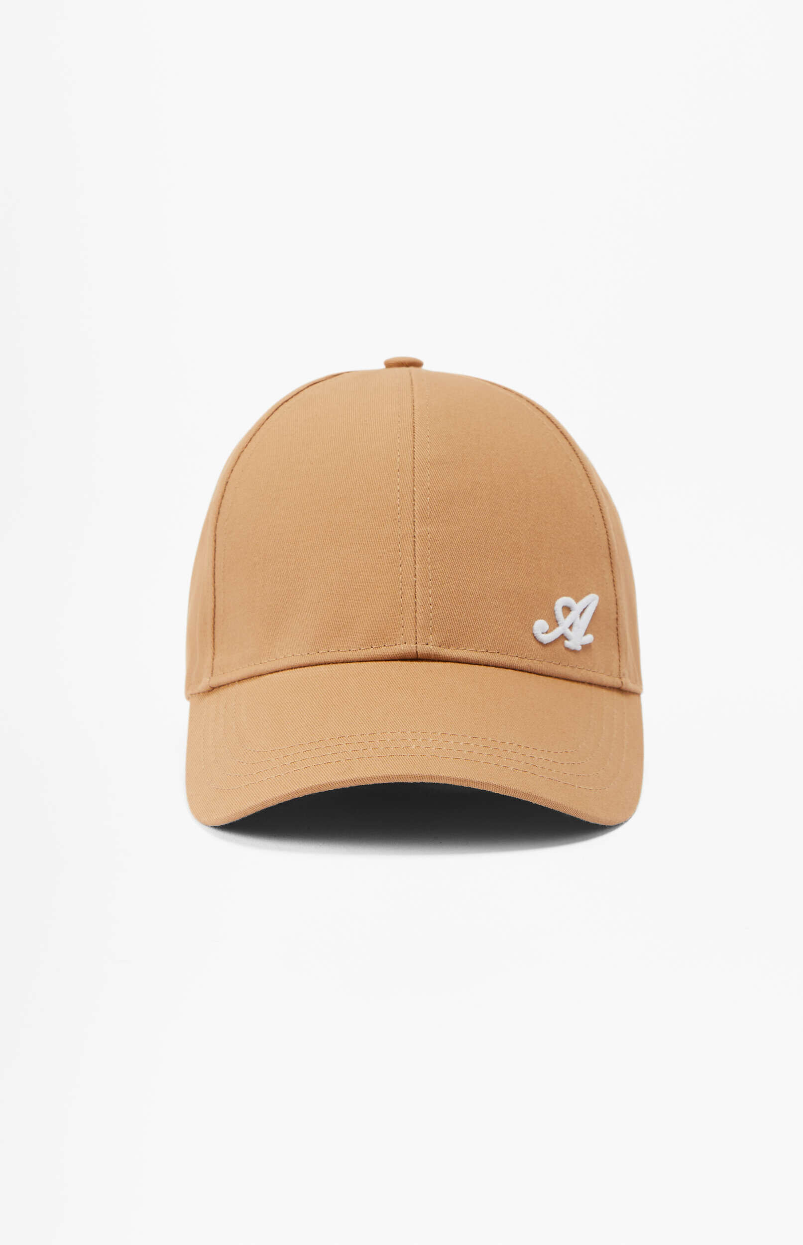 A tan baseball cap with a white embroidered stylized letter 'A' on the front, set against a white background.