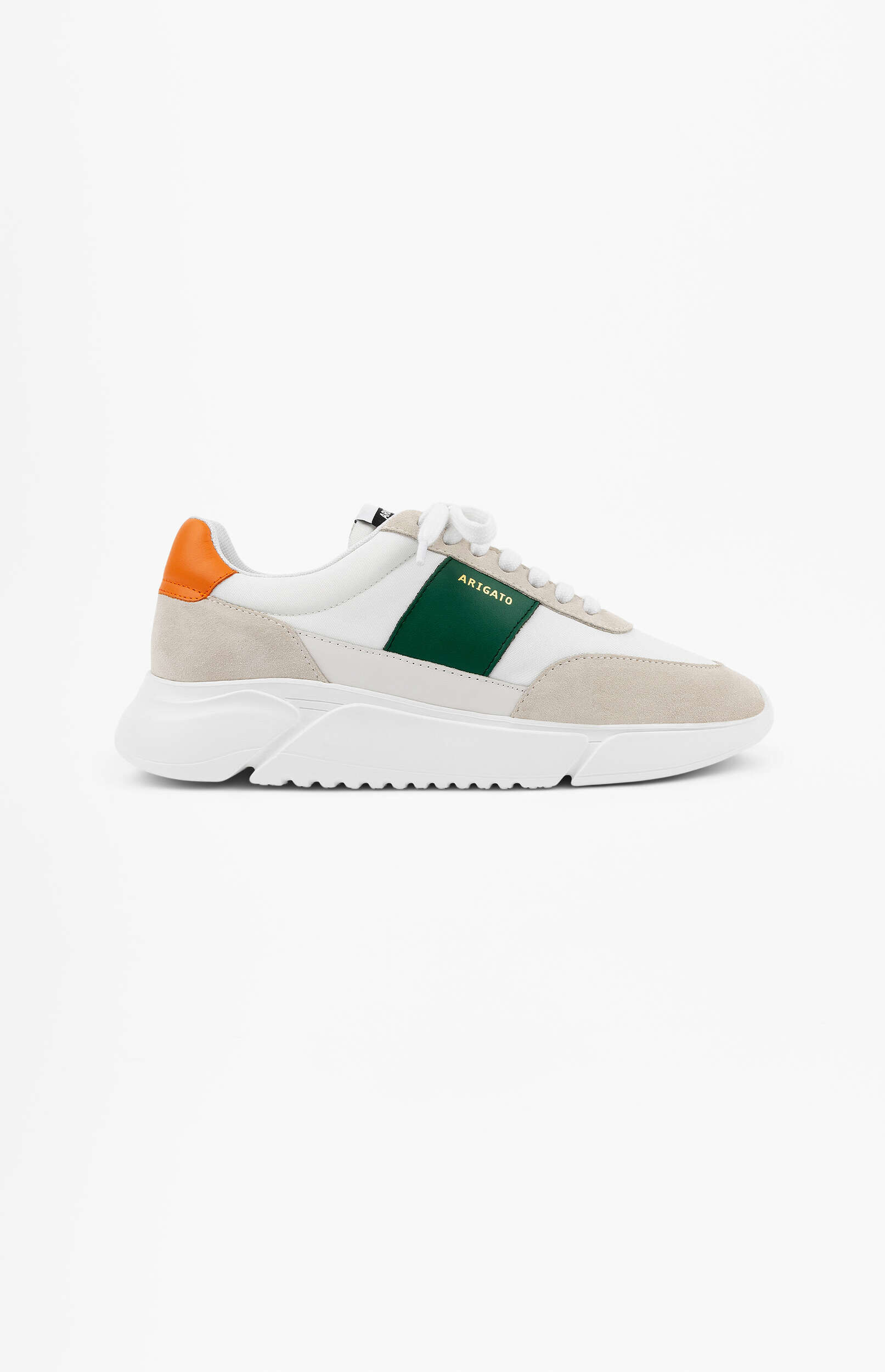 A clean, side-profile product shot of a white and beige ARIGATO sneaker with a dark green side stripe featuring the brand name in gold, and an orange accent tab on the heel, all set against a pure white background.