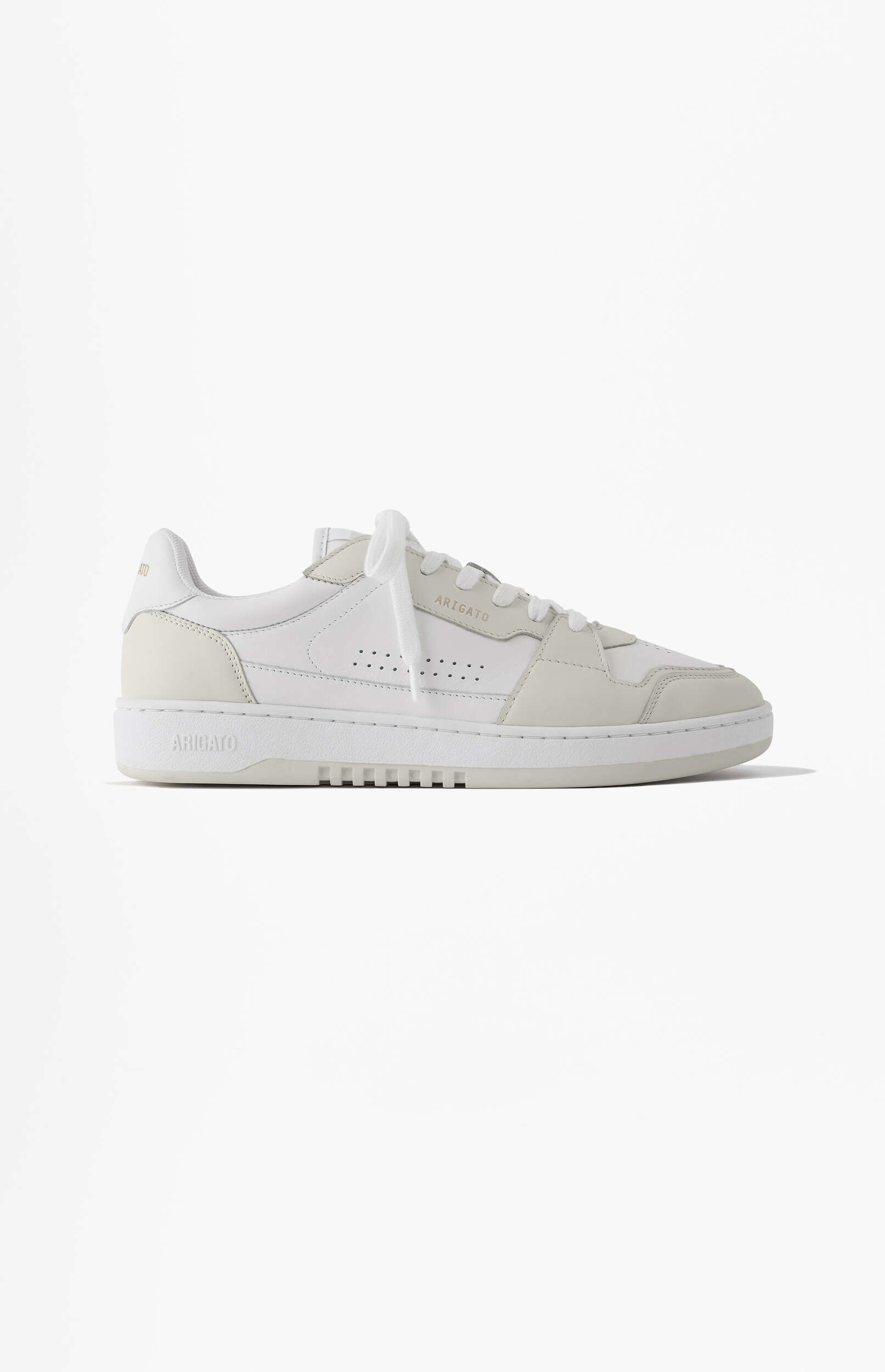 A white and light grey ARIGATO sneaker, featuring white leather and light grey suede accents, with white laces on a plain white background. The brand name 'ARIGATO' is visible on the tongue and the side of the sole.