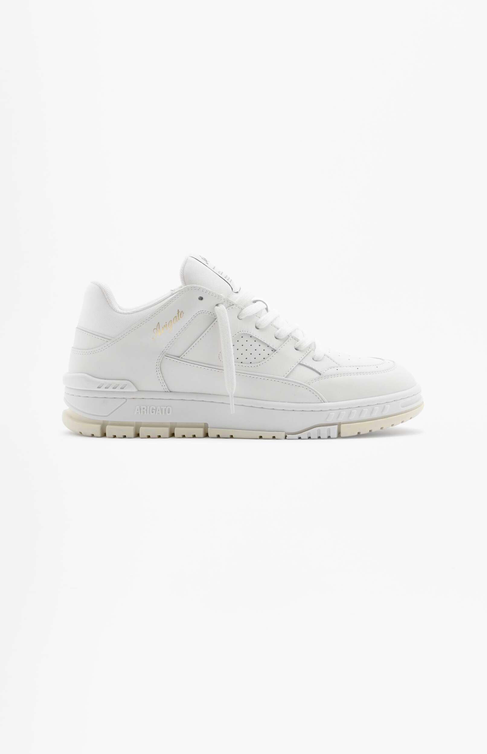 A white leather Axel Arigato sneaker with white laces and a light beige sole, shown in a side profile view against a plain white background.