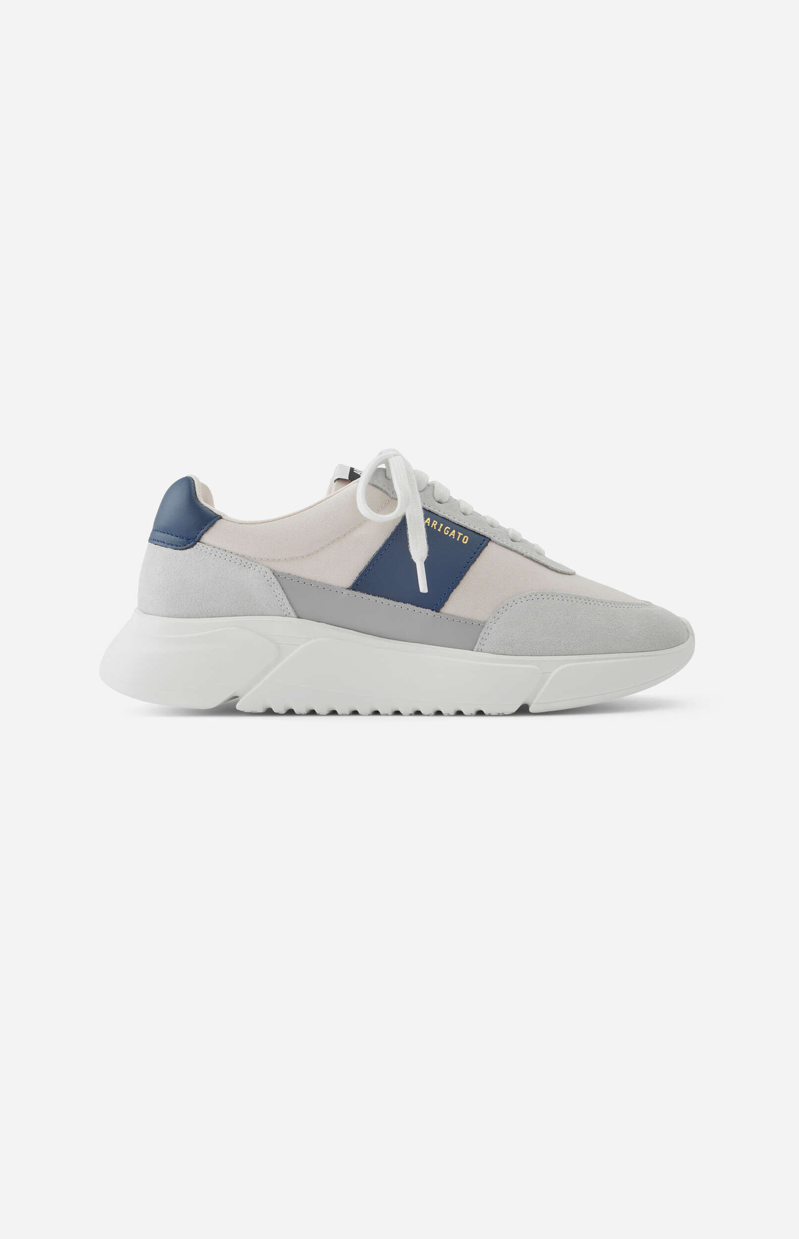 A single Axel Arigato Genesis Vintage Runner sneaker in light gray, cream, and navy blue, featuring a thick white sole, white laces, and 'ARIGATO' branding on the side. The sneaker is shown against a plain white background.